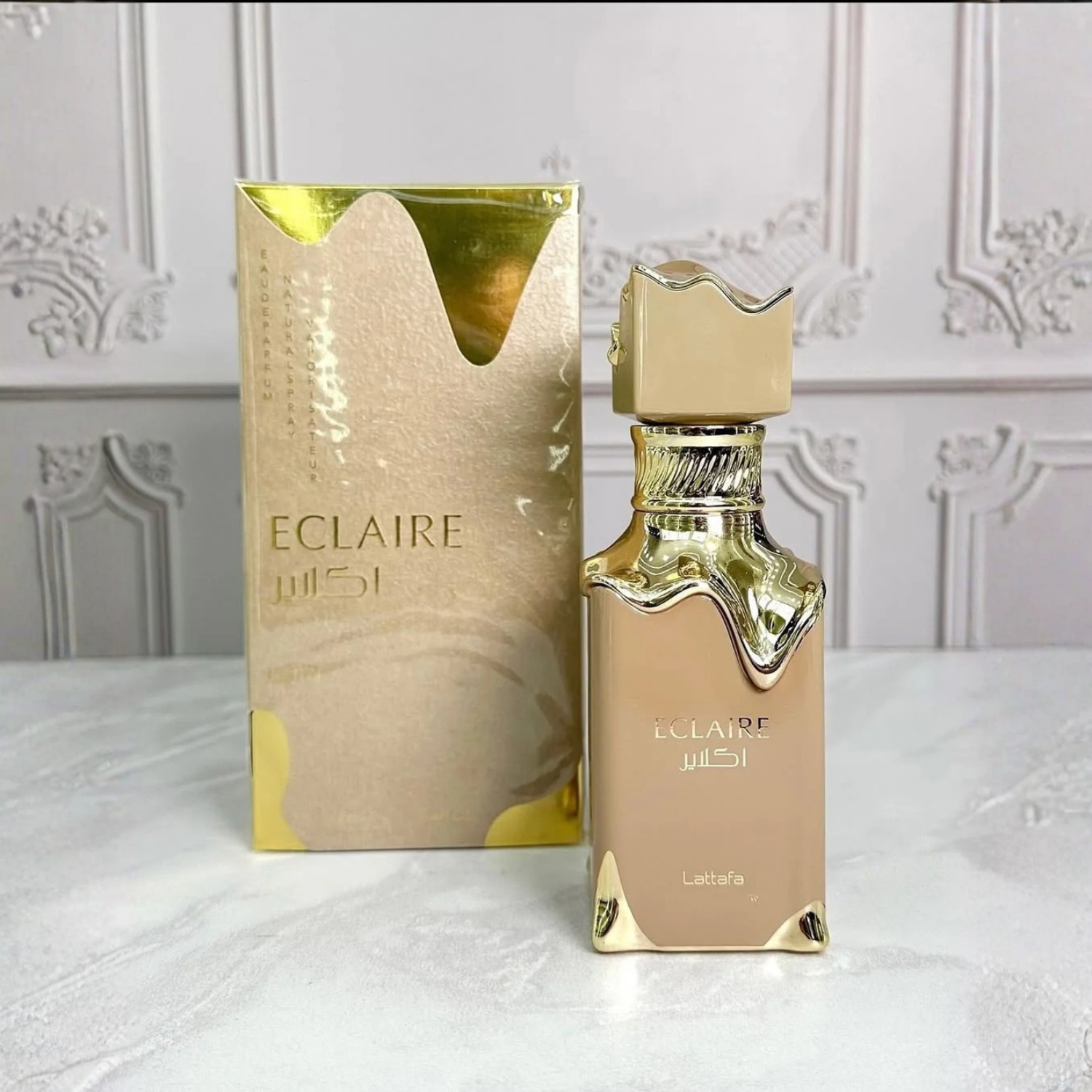 Flacon et boîte Éclaire Lattafa parfum femme élégant raffiné